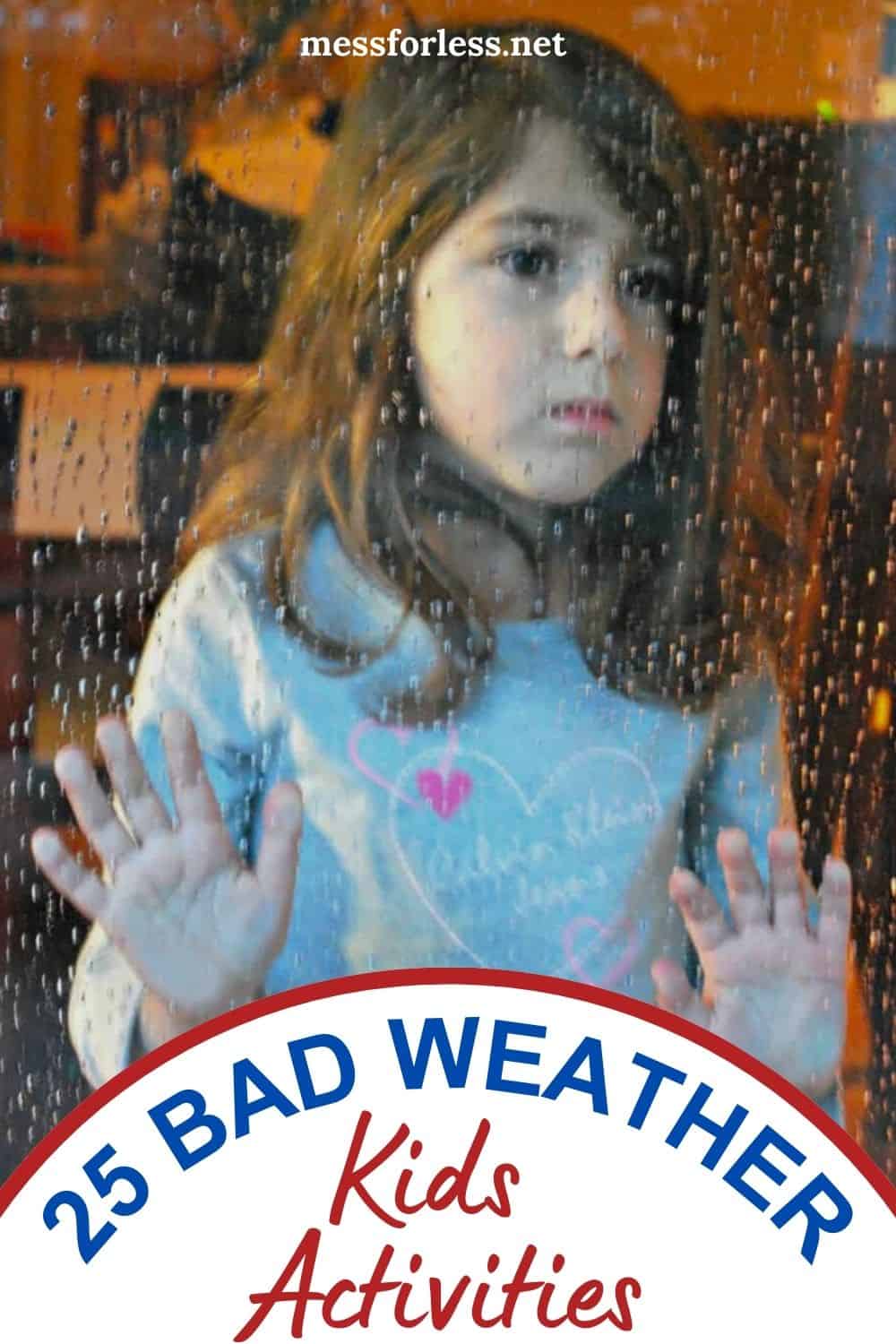 child staring out window at rain