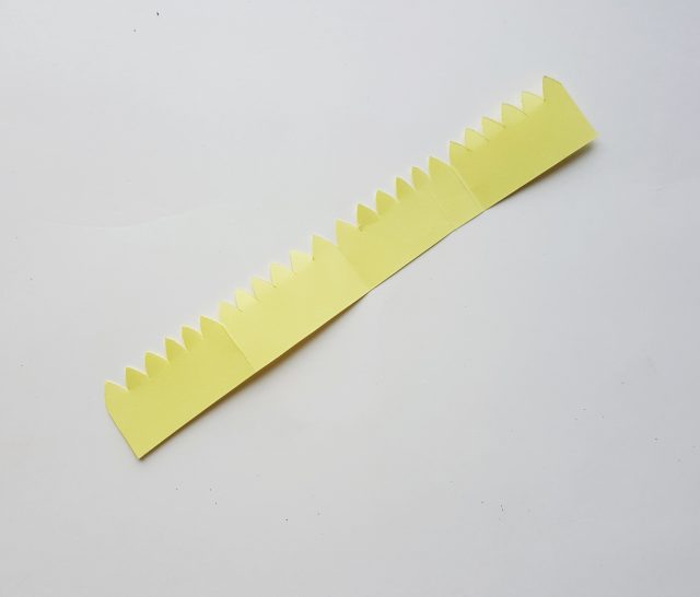 yellow paper strip for a paper flower craft