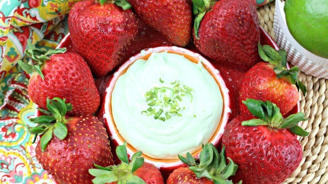 Key Lime Cheesecake Dip surrounded by strawberries