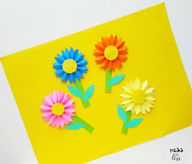 paper flowers on yellow paper