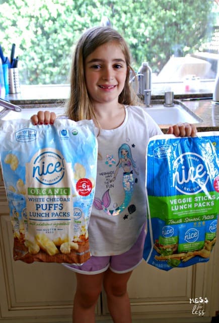 child holding Nice! products