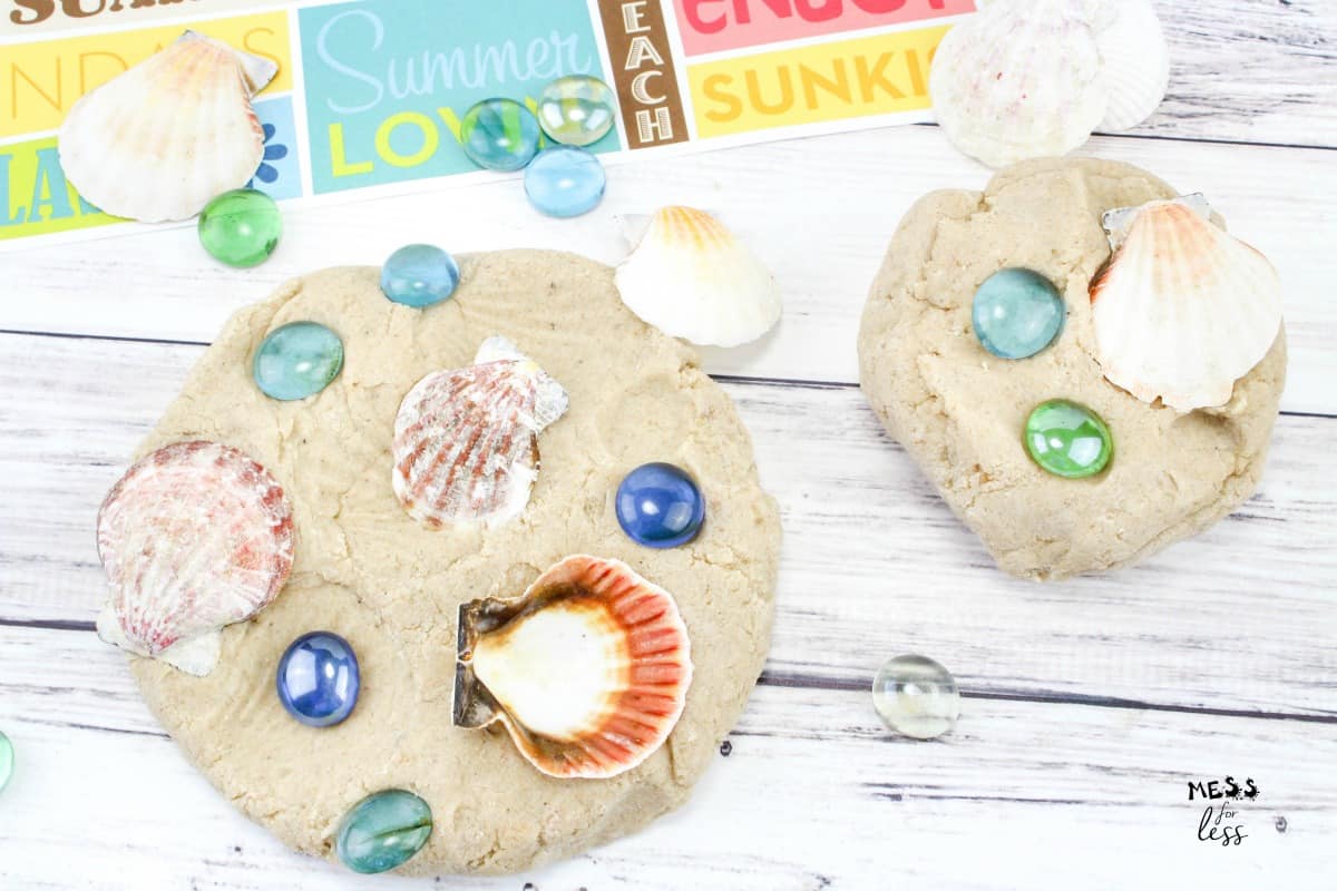 sand playdough with shells and glass beads