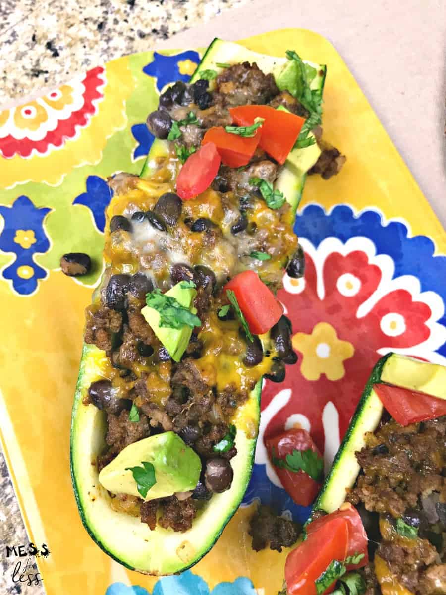 zucchini taco boats on a colorful platter