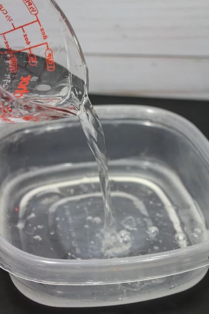 pouring water into a bowl