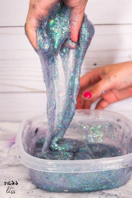 kneading glitter slime