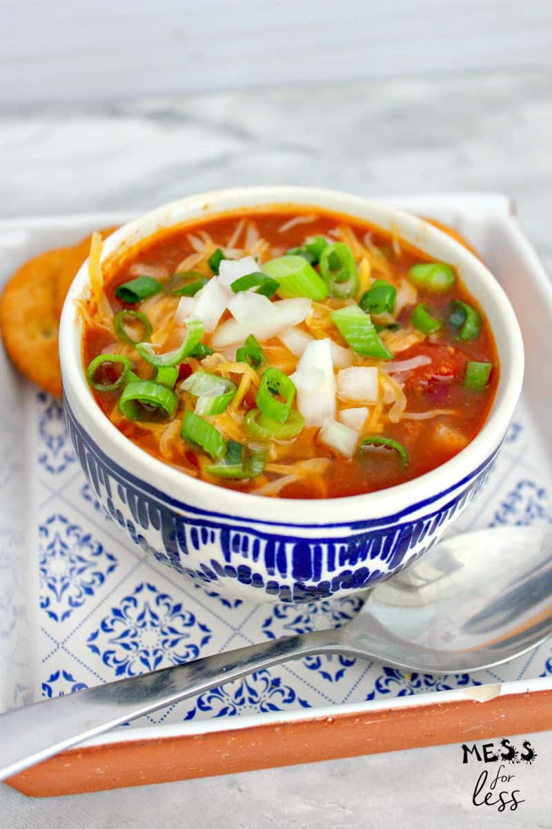 Instant Pot chili in a bowl with a spoon