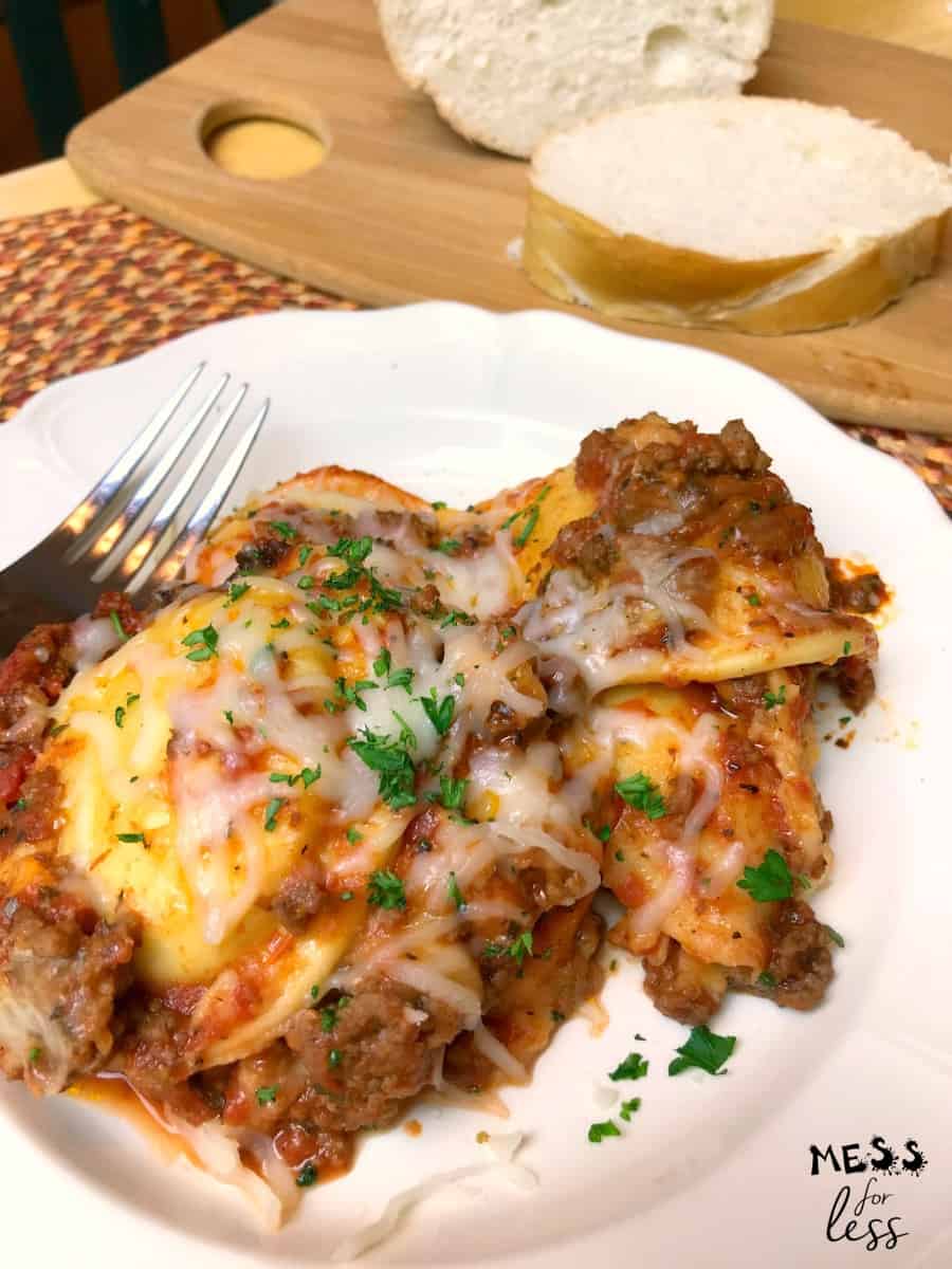 Ravioli Lasagna with meat sauce on a white plate