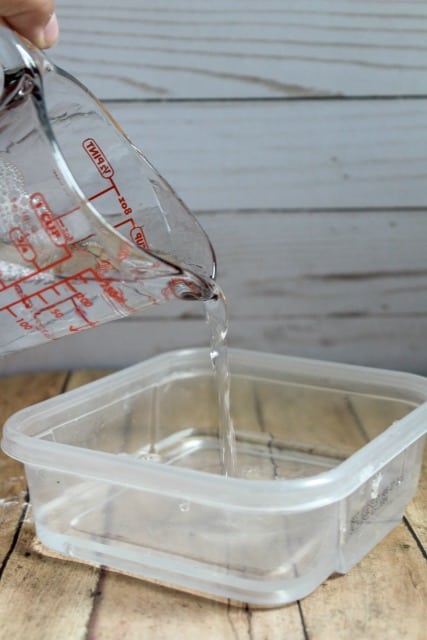 adding water to a container