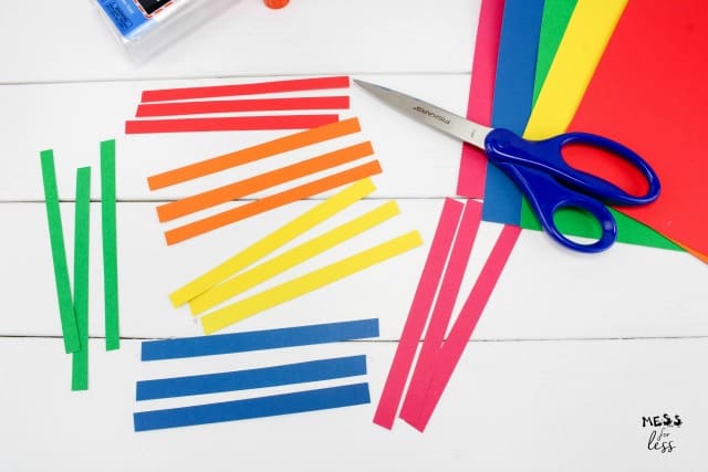cut up strips of construction paper and scissors