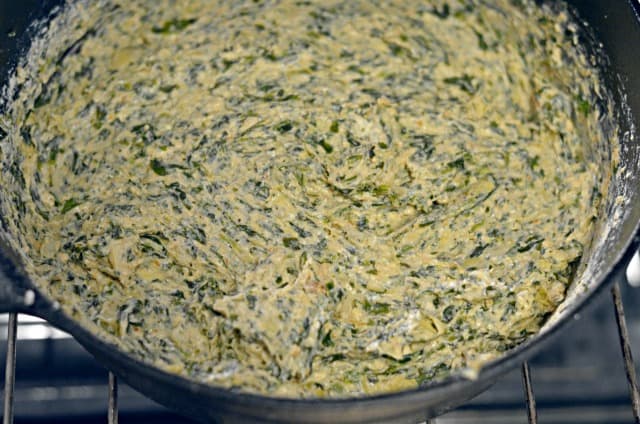 spinach artichoke dip in skillet