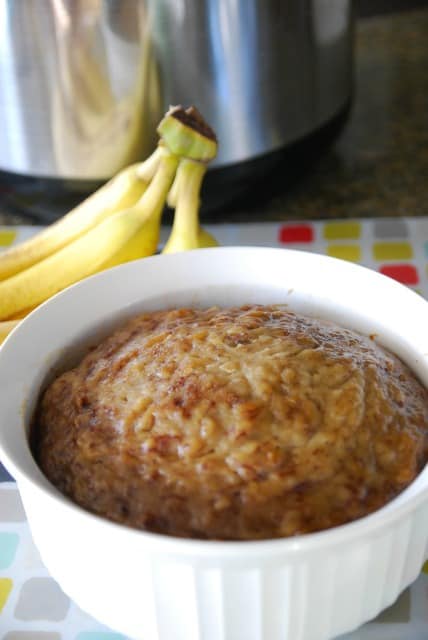 instant pot banana bread with bananas in the background