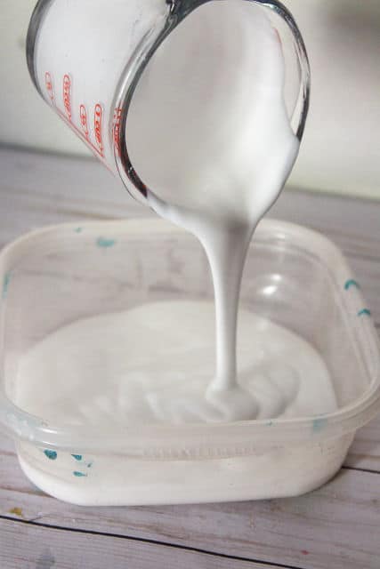pouring glue into a bowl