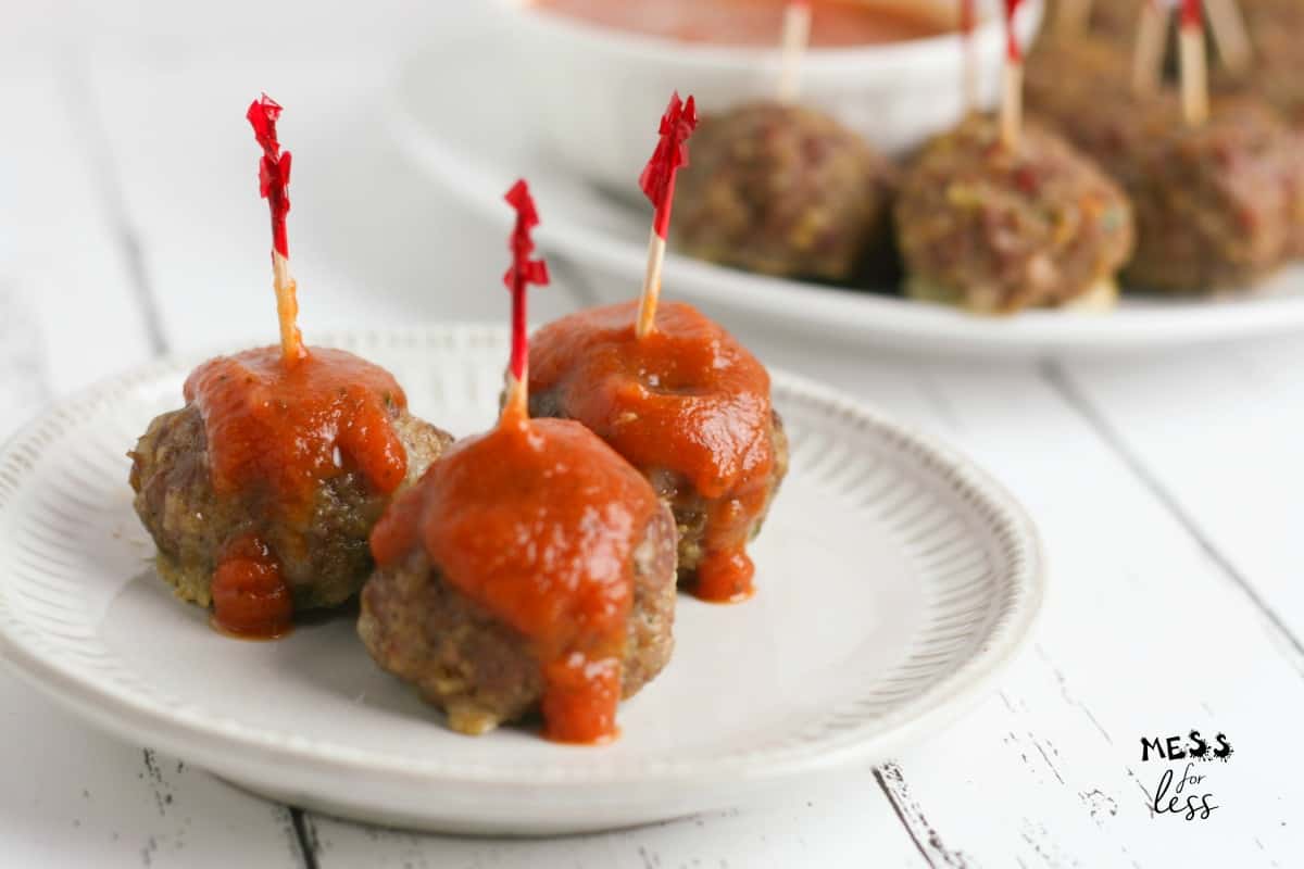 Baked Mozzarella Stuffed Meatballs with marinara sauce