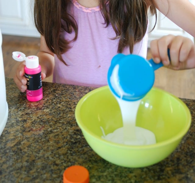 pouring glue into a bowl