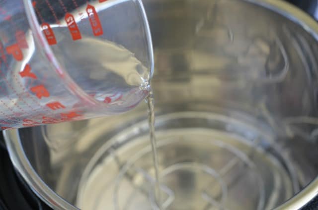 pouring water into an Instant Pot