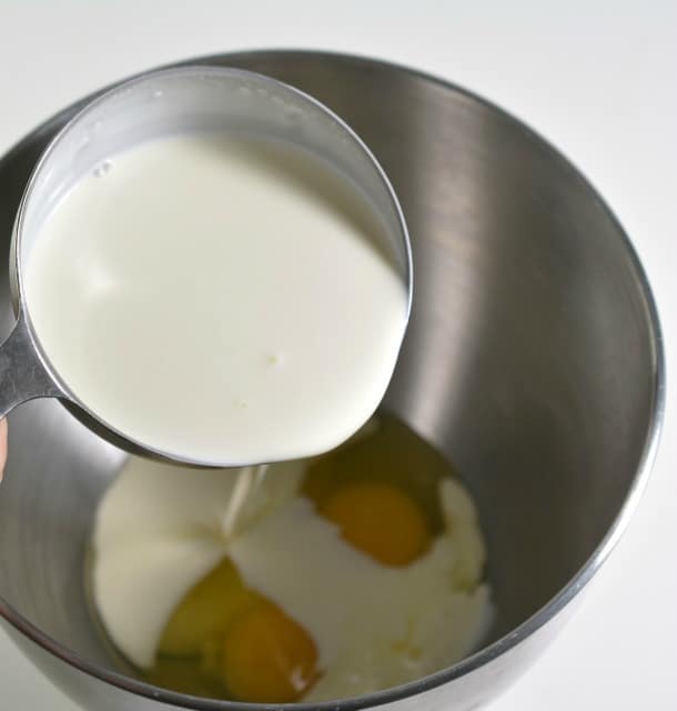 pouring cream into a bowl