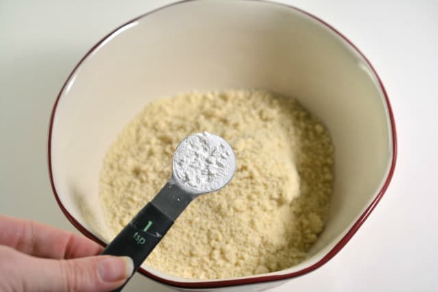 baking soda in a measuring spoon