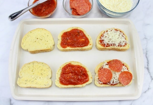 making garlic bread pizza