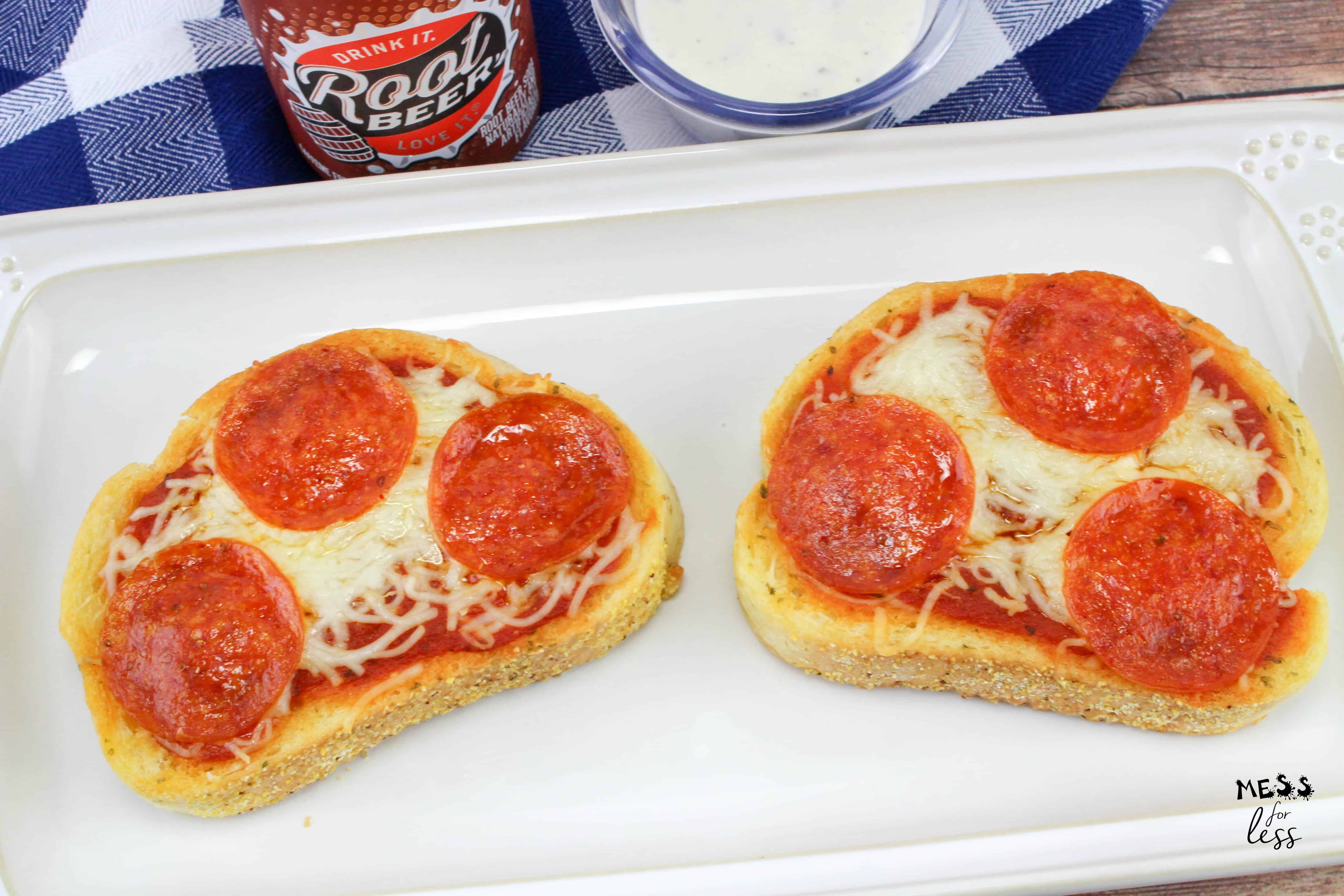 two pieces of garlic bread pizza on plate