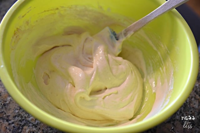 cool whip mixed with pb2 in light green bowl