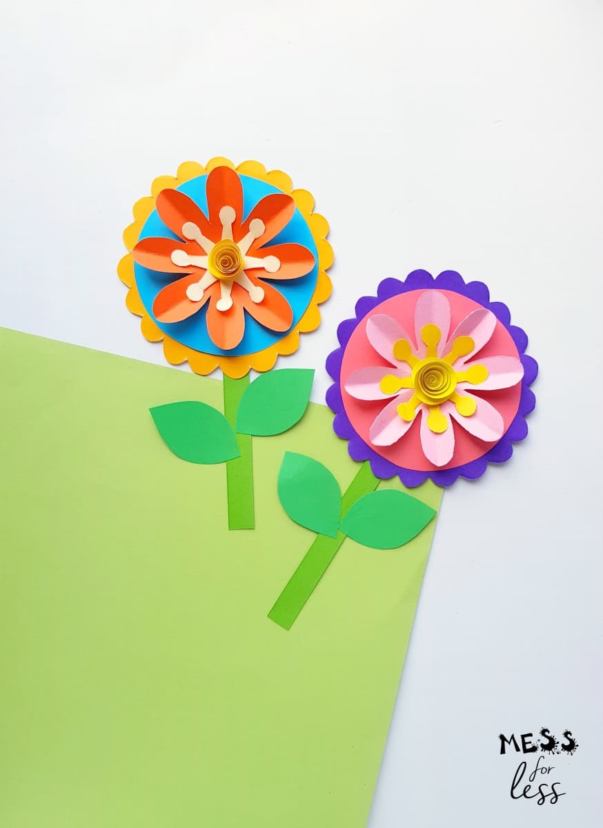 paper flowers on green background