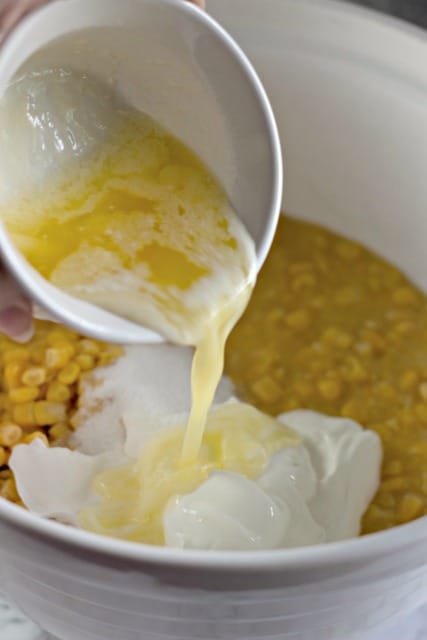 pouring melted butter into a bowl