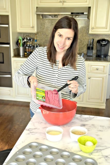 woman making meatballs