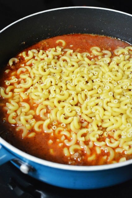 noodles in a pot with sauce
