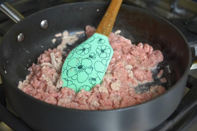 frying up ground turkey in a pan