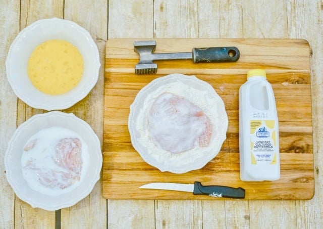 dipping chicken in buttermilk and flour