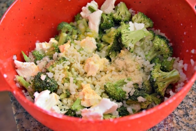 cauliflower rice, broccoli, cream cheese in a bowl