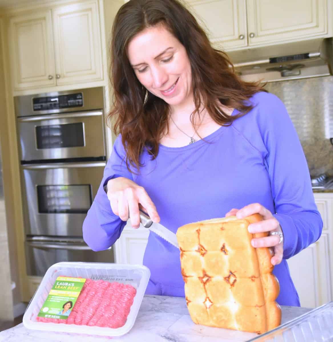 slicing Hawaiian rolls