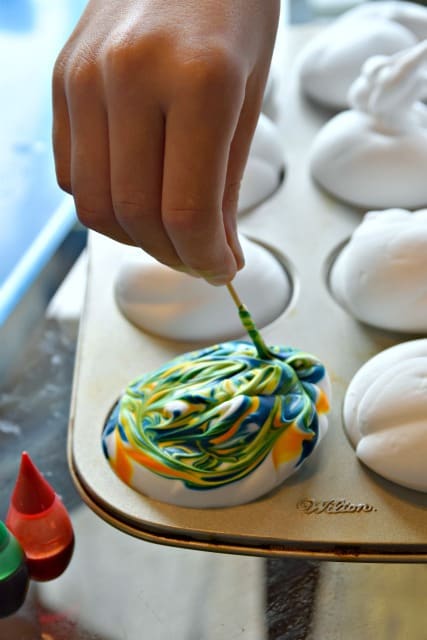 swirling food coloring and shaving cream