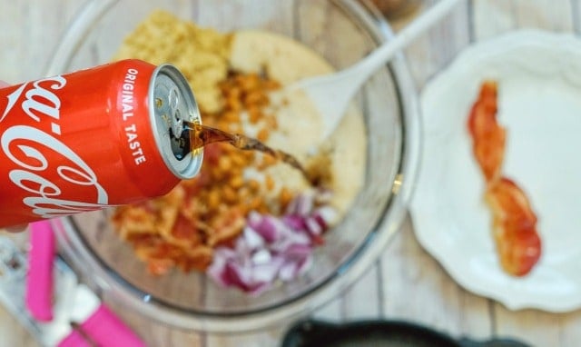 pouring coke on beans