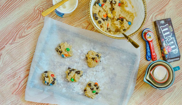 m&m cookie dough on a cookie sheet