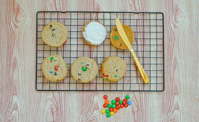 making m&m cookie sandwiches