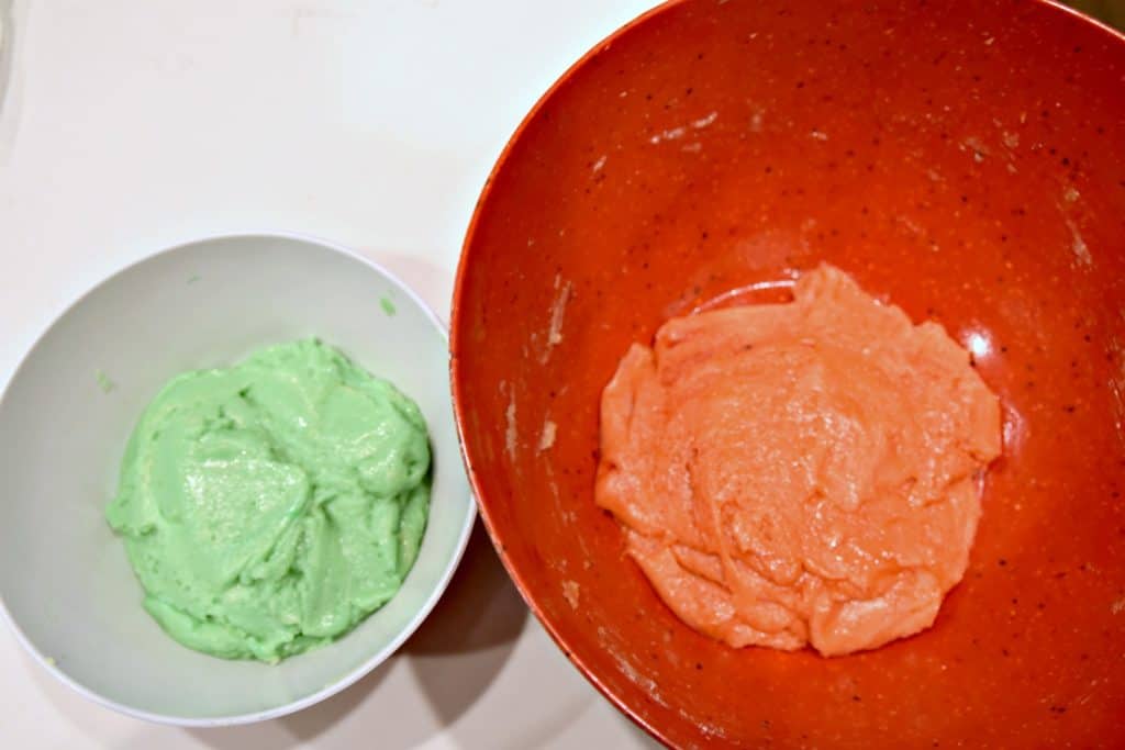red and green dough in bowls
