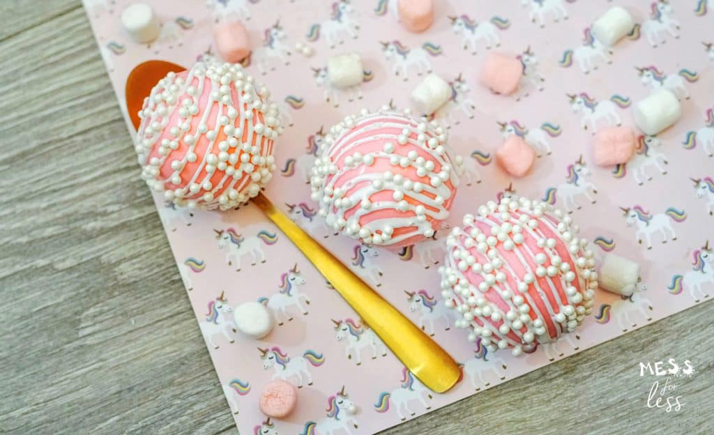 pink hot chocolate bombs with sprinkles