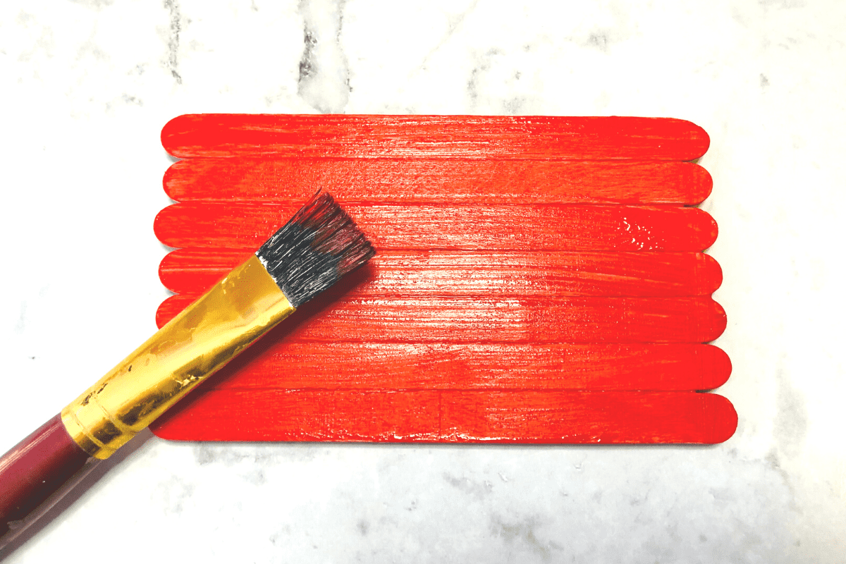 red painted popsicle sticks