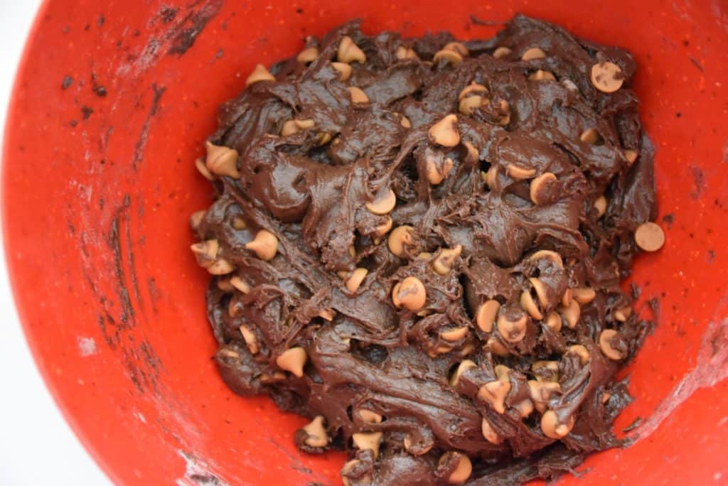 chocolate cookie batter with butterscotch chips