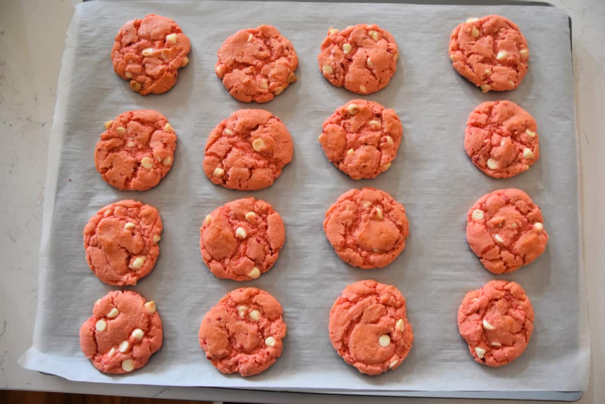 strawberry cake mix cookies on a cookie sheet