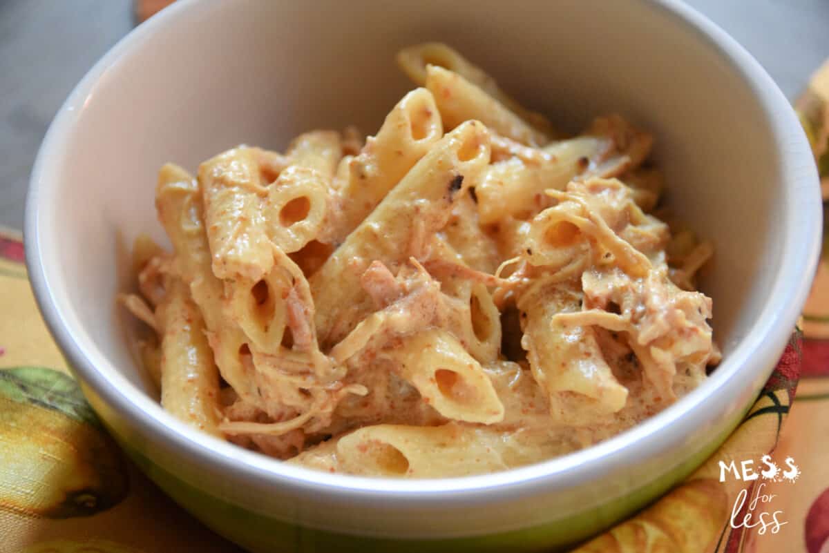chicken and pasta in a white bowl