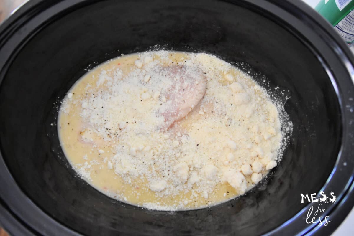 chicken in a crock pot with olive garden dressing and parmesan cheese