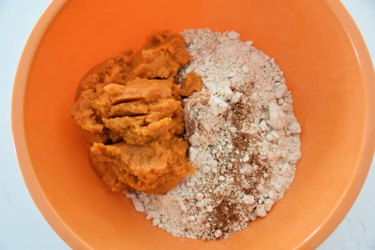 cake mix and pumpkin puree in a bowl