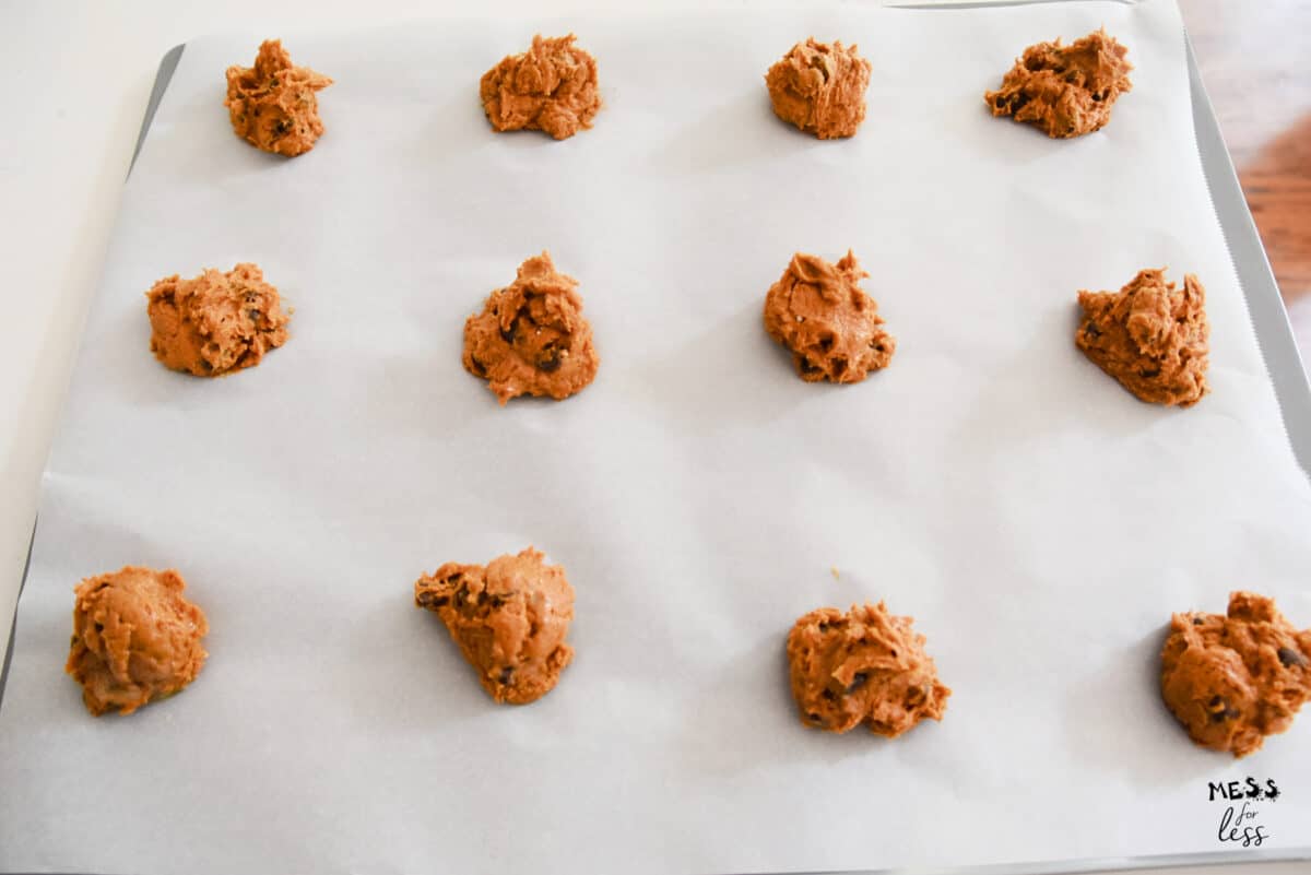 pumpkin cookies on a cookie sheet