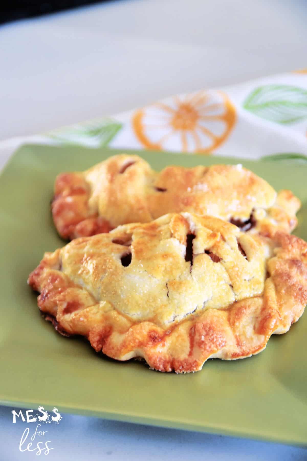 apple turnovers on a green plate