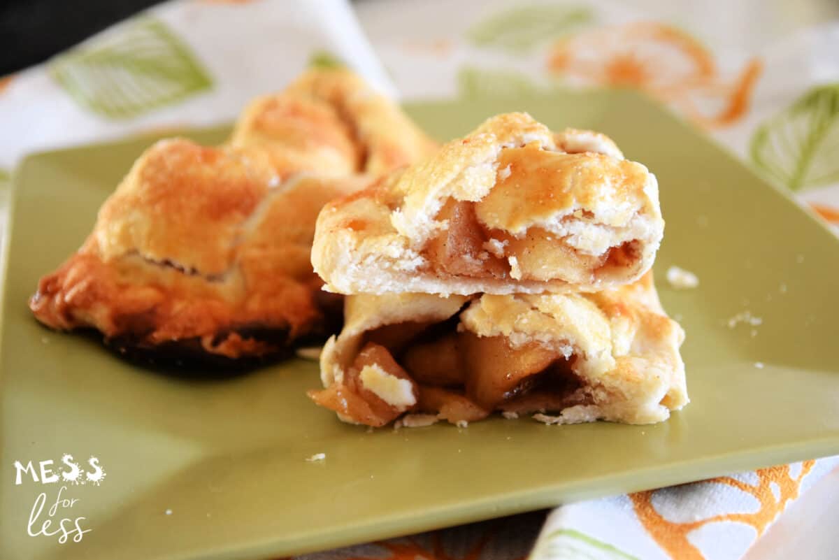 sliced apple turnover on a green plate