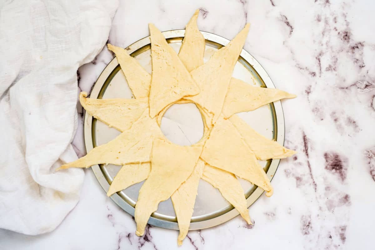 crescent-rolls-spread-out-on-a-pan