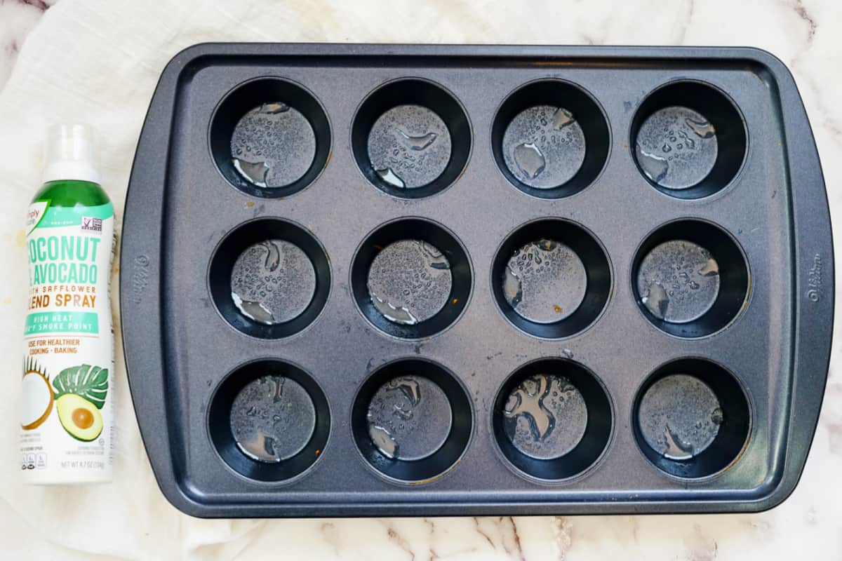 muffin tin sprayed with cooking spray