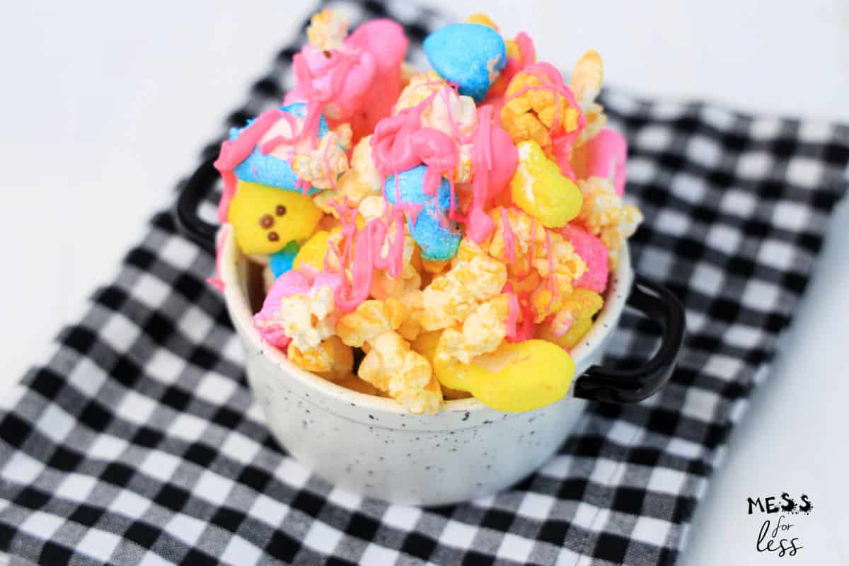 popcorn and peeps in a bowl with melted candy